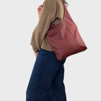 Sacoche en cuir recyclé (avec un petit bobo)