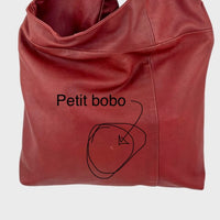 Sacoche en cuir recyclé (avec un petit bobo)
